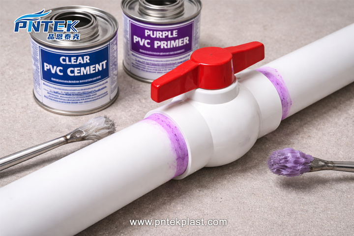 Connecting a Socket Ball Valve to PVC Pipe A PVC socket ball valve (slip x slip) being solvent-welded between two pieces of PVC pipe