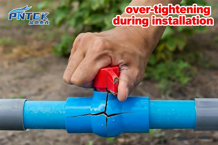 Cracked PVC Valve Port from Over-tightening A close-up of a cracked PVC ball valve port next to a metal fitting