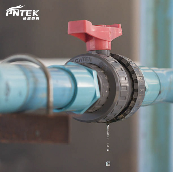 A high-quality PVC ball valve installed correctly versus a leaking one