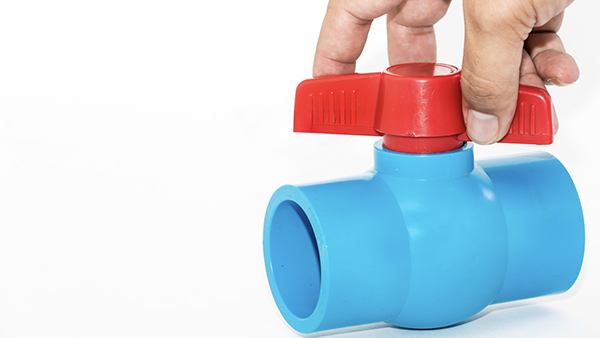 A cutaway view of a ball valve showing the internal ball in open and closed positions