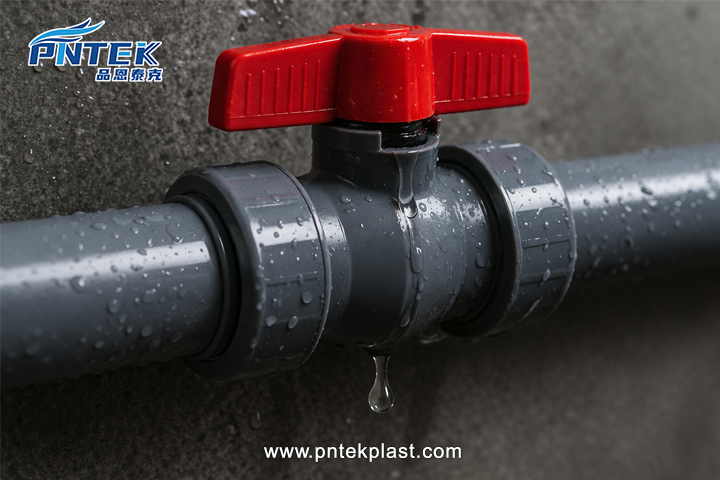 Leaking PVC Ball Valve A close-up image showing a single drop of water leaking from a valve's stem