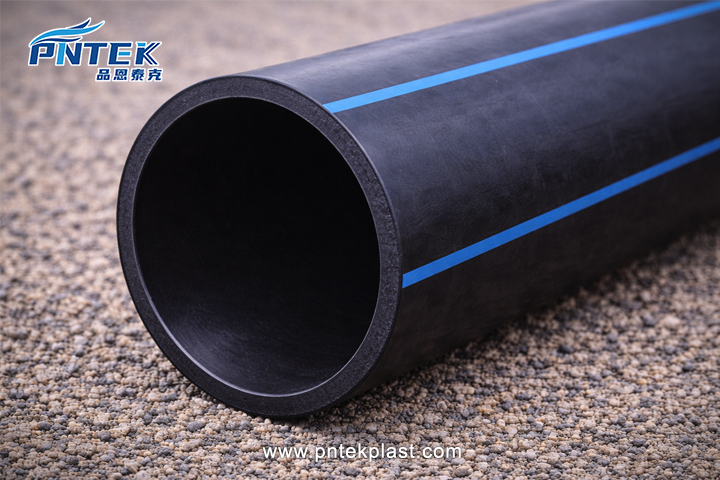 A cross-section of a black PE 100 pipe showing its smooth interior