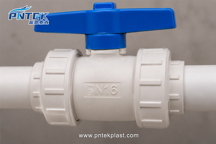 PVC Ball Valve Pressure Rating PN16 A close-up view of a PVC ball valve clearly showing the 'PN16' pressure rating molded into the body