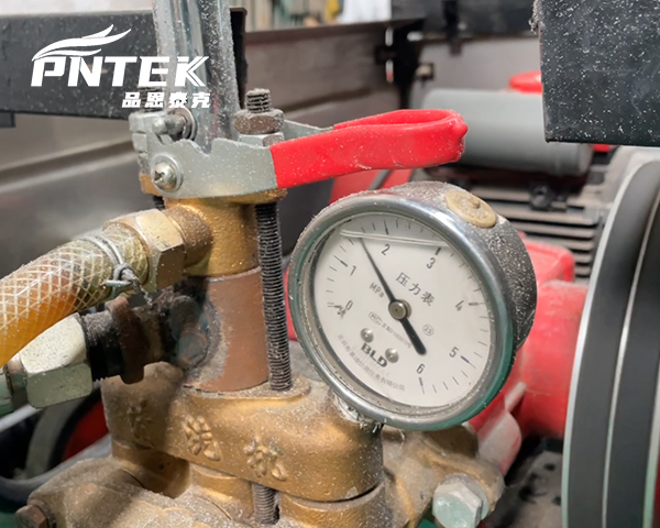 A Pntek PVC ball valve with the PN16 pressure rating clearly marked on the body