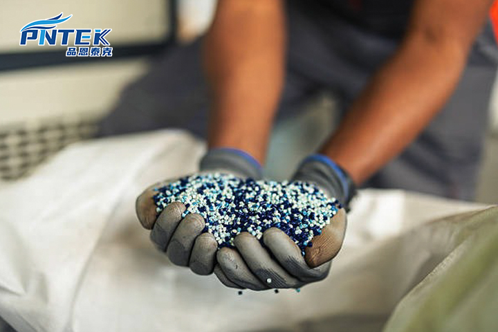 Polypropylene Material in Pipe Fittings Close-up shot of the textured grip on a Polypropylene nut of a compression fitting