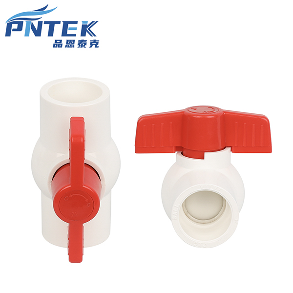 A person unable to turn a stiff PVC ball valve handle