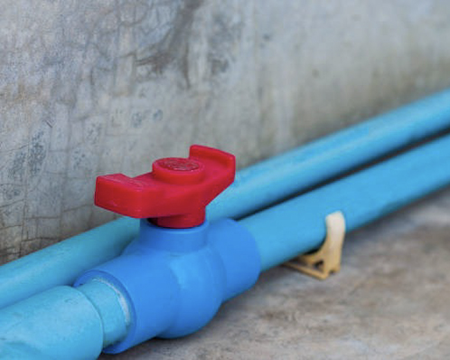 A complex irrigation manifold built entirely from PVC pipes and Pntek PVC valves