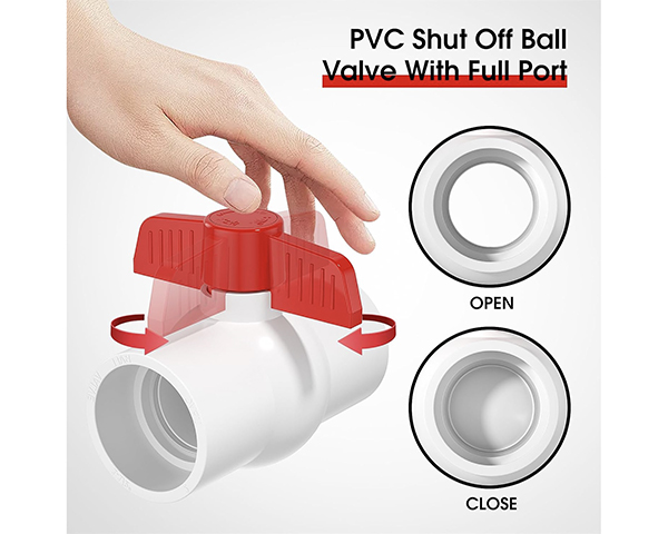A hand turning the handle of a Pntek PVC ball valve on a pipe